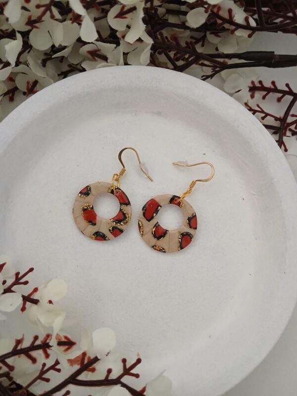Boucles d'oreilles pendantes en pâte polymère léopard